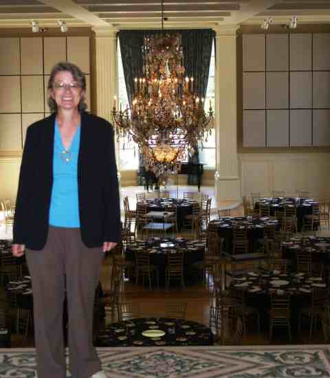 Carla at the top of the staircase leading to Grand Hall